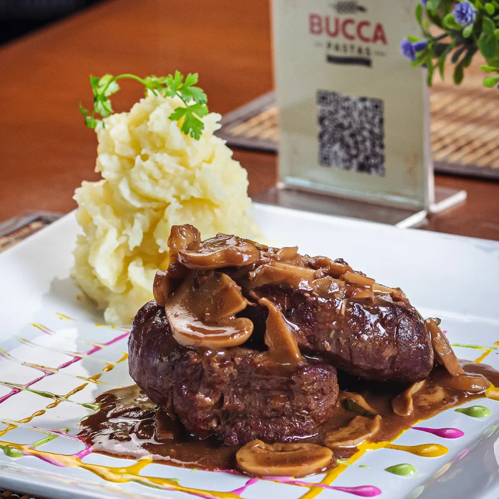 Cerdo con Papa Bucca Pastas